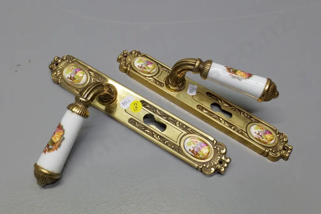 pair of cast brass and Limoges-style porcelain door latches - marked Spain H-250 Image 1++