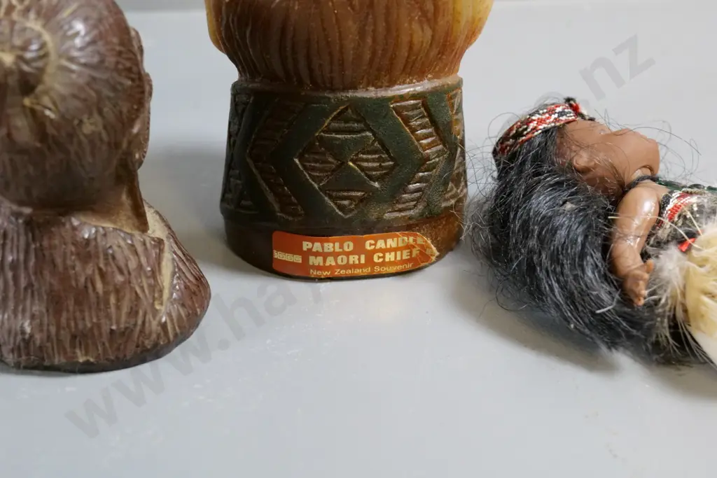 Maori themed souvenir items - 2 candles and a small doll, larger candle is H-150 Image 1++