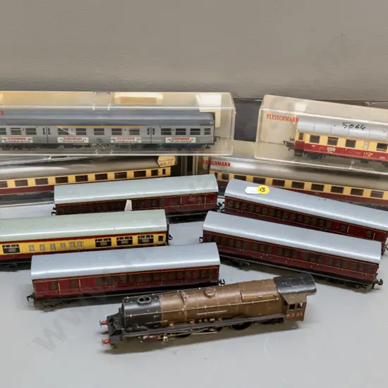 assorted model railway items - Duchess of Atholl locomotive, 9 assorted passenger carriages, some in cases