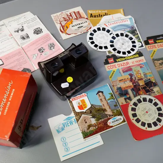 Viewmaster lighted viewer Model F w/original box & several travel souvenir reels. Requires batteries, untested, box worn