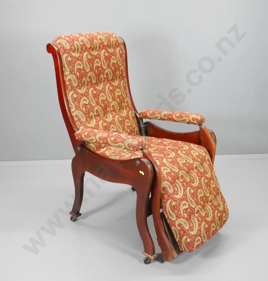 vintage mahogany framed recliner chair on casters covered in paisley damask - some scratches to legs H1180 W640 D820 Image 1++