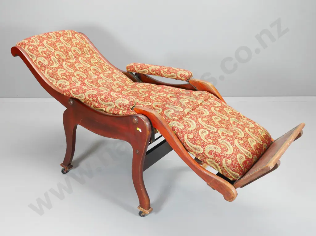 vintage mahogany framed recliner chair on casters covered in paisley damask - some scratches to legs H1180 W640 D820 Image 1++