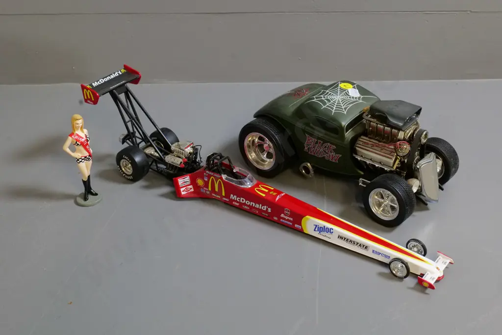 2 die-cast model cars - Muscle Machine Ford Black Widow, figurine, and an Action drag racer L-420 Image 1++