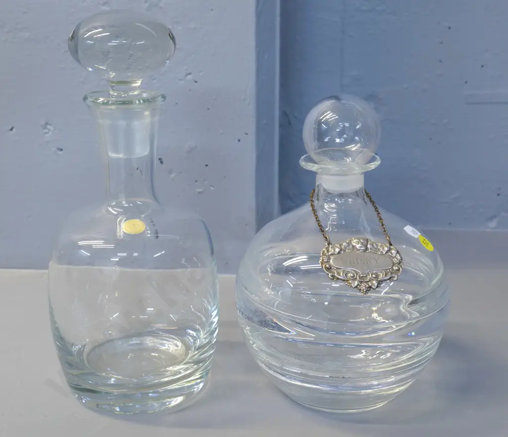 2 heavy clear glass stoppered decanters, one with metal whisky label, taller H-280 marked Romania Image 1++
