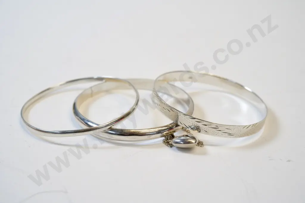 3 silver bangles stamped 925 Image 1++