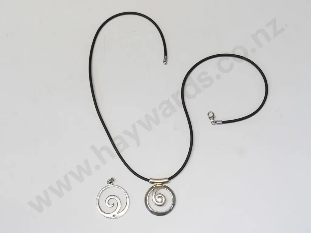 2 silver swirl necklace 1 on leather strand both stamped 925 Image 1++
