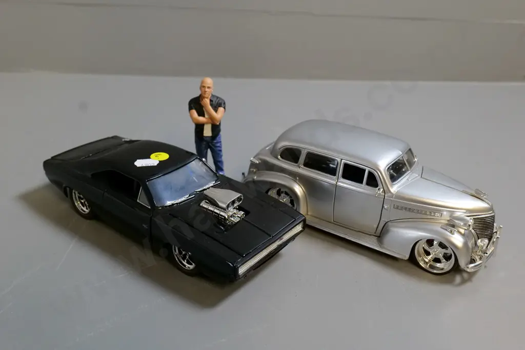 2 Jada die-cast model cars - 1:24  black Dodge Charger, 1:24 Chevrolet Master Deluxe and a figure Image 1++