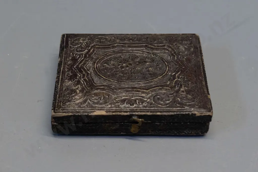 antique small ambrotype photograph in embossed velvet lined case - case is H-75 W-65 Image 1++