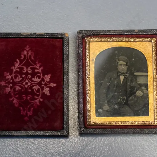 antique small ambrotype photograph in embossed velvet lined case - case is H-75 W-65