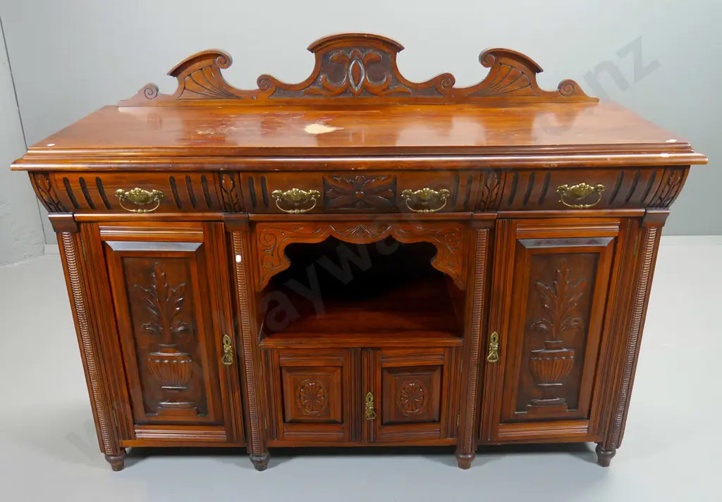 vintage kauri sideboard w/carved panel doors and upstand, 3 drawers & 4 doors - damage to polish on top H1160 W1510 D570 Image 1++