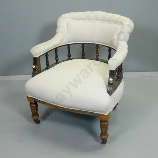 vintage spindle back tub chair on porcelain casters with corded upholstery detail H760 W640 D640