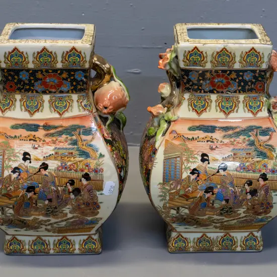 pair of Chinese hand painted ornately decorated vases - one has pomegranate handles, one flowers, has maker's mark H-270