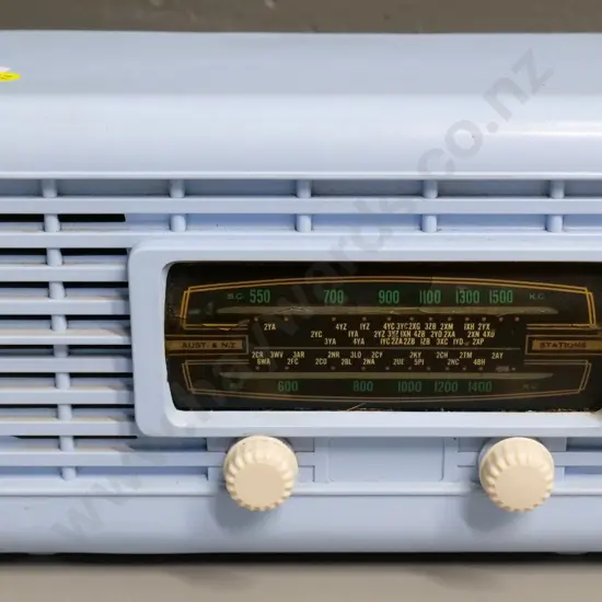 vintage pale blue bakelite mantel radio - note says serviced 2022