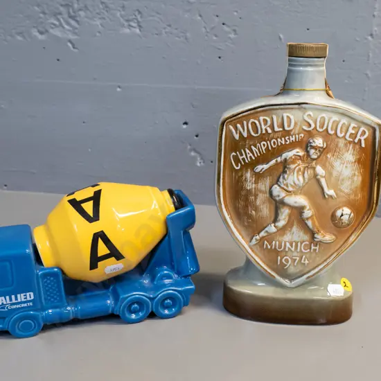 two sealed novelty decanters - Jim Beam Munich 1974 soccer, Allied Concrete mixer w/Portrayal port