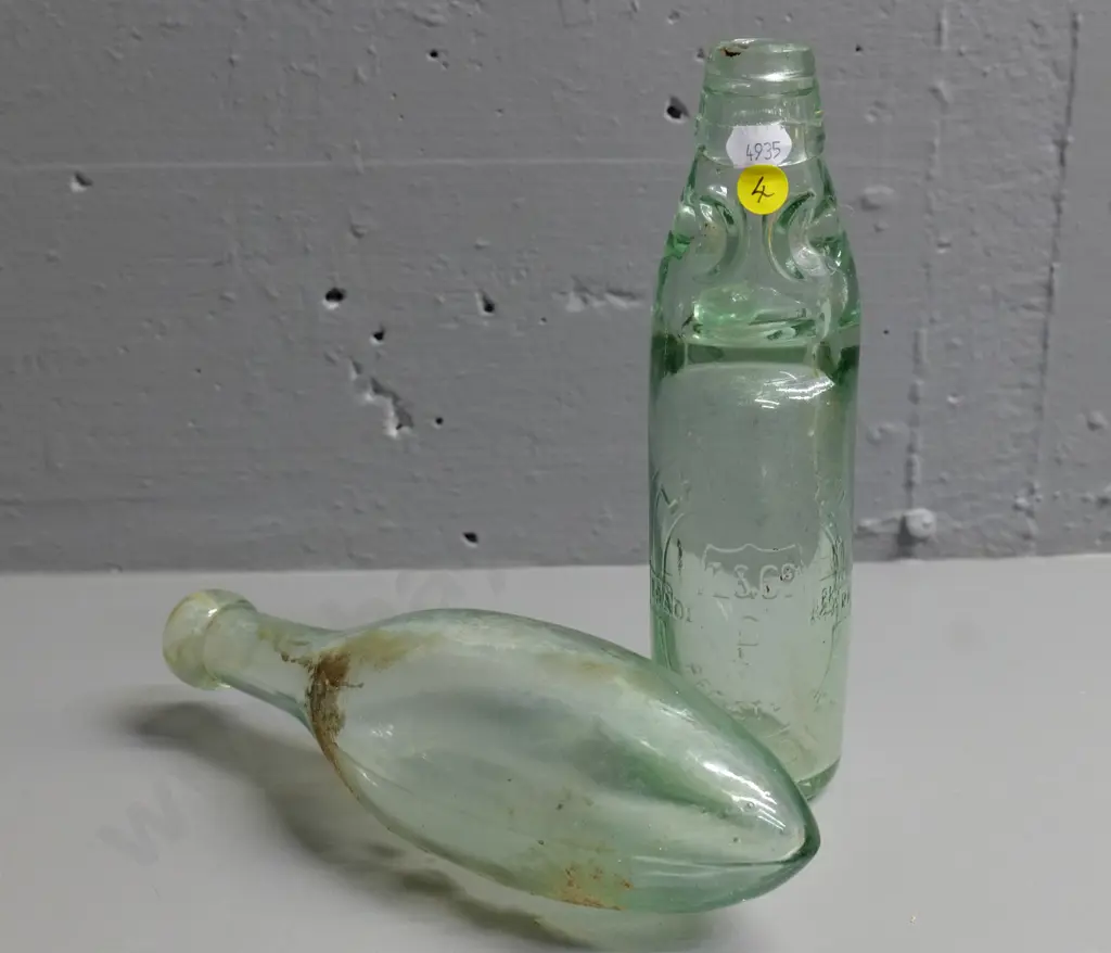 Lanes clear marble bottle and an unmarked torpedo bottle Image 1++