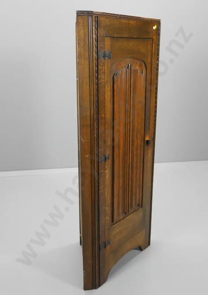 oak Tudor style corner cabinet with linen fold carved door, wooden door catch H-1350 W-620 D-360 Image 1++