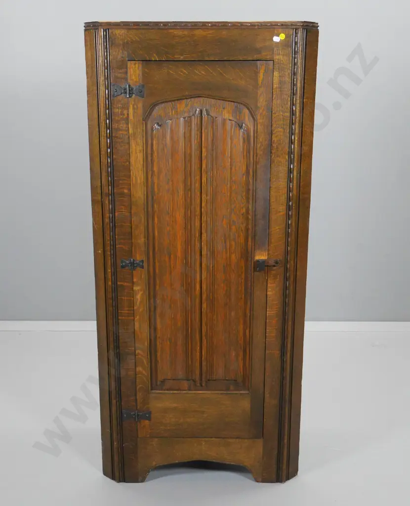 oak Tudor style corner cabinet with linen fold carved door, wooden door catch H-1350 W-620 D-360 Image 1++