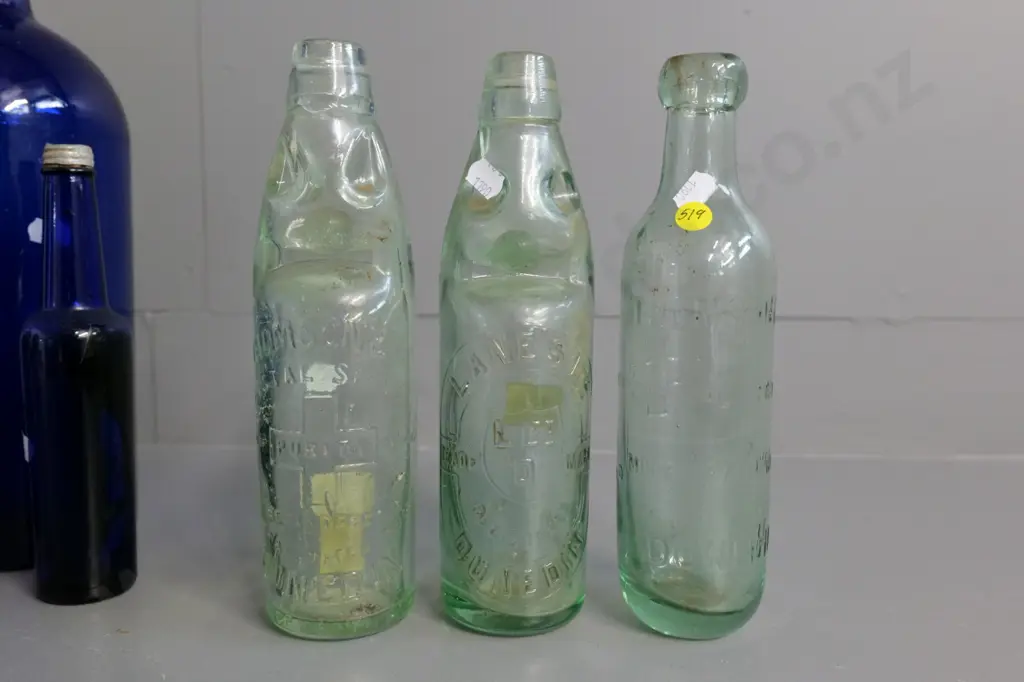 Bottles - Lanes marble with crack, Thomsons marble, Lane's Crystal Spring Mineral Water and 5 blue glass bottles Image 1++