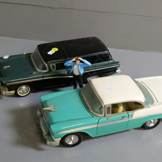 2 die-cast model cars - 1:18 Road Tough Chevrolet Belair and 1:18 Road Legends Ford Ranchero plus figurine
