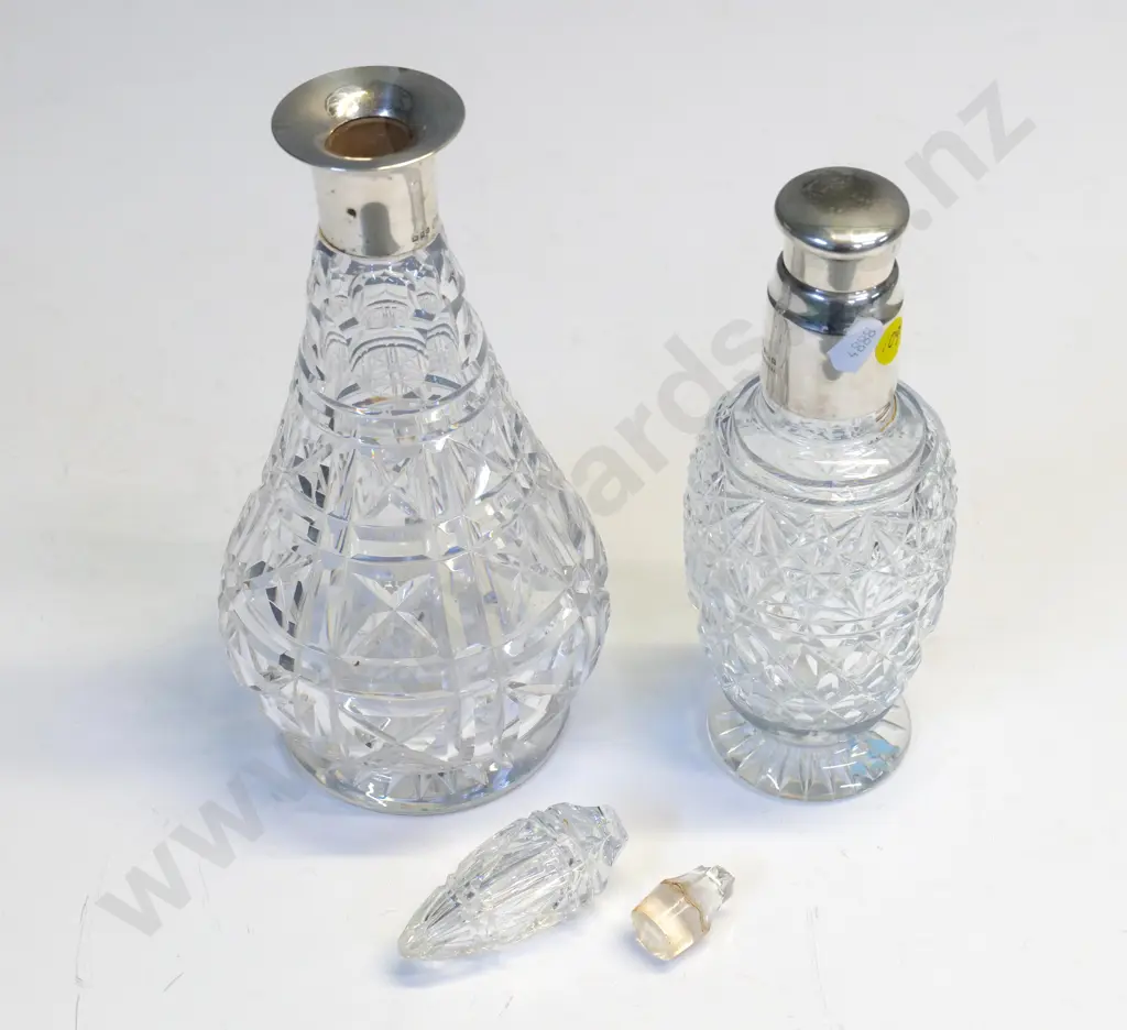 2 sterling silver mounted cut crystal decanters - one has broken stopper, sterling stopper on shorter one is stuck fast Image 1++
