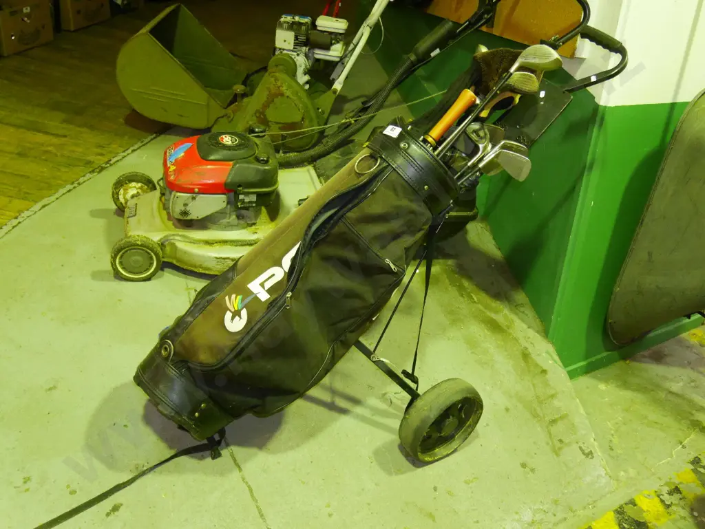 golf clubs and trundler Image 1++
