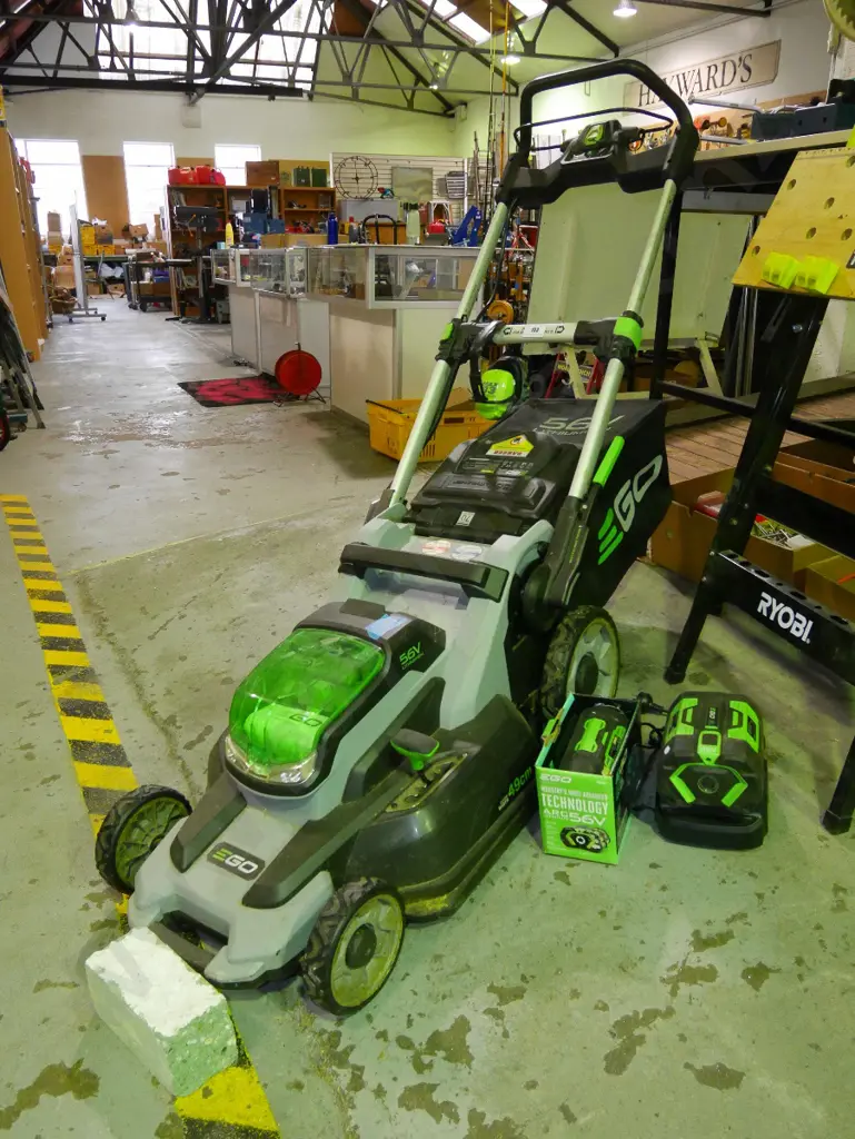 Ego 56V lithium-ion lawn mower with ear muffs, charger, 2 batteries Image 1++