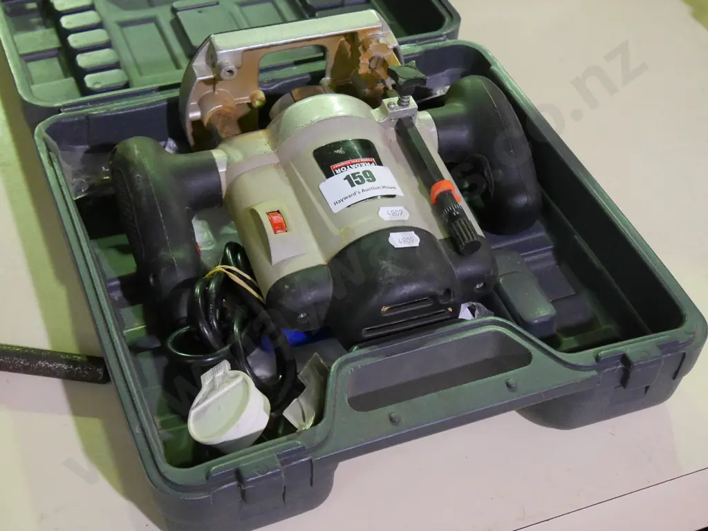 cased Predator plunge router Image 1++