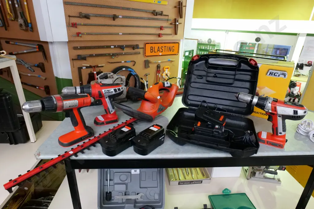 3x Black & Decker battery drills, hedge trimmers, 4 batteries, 1 charger Image 1++