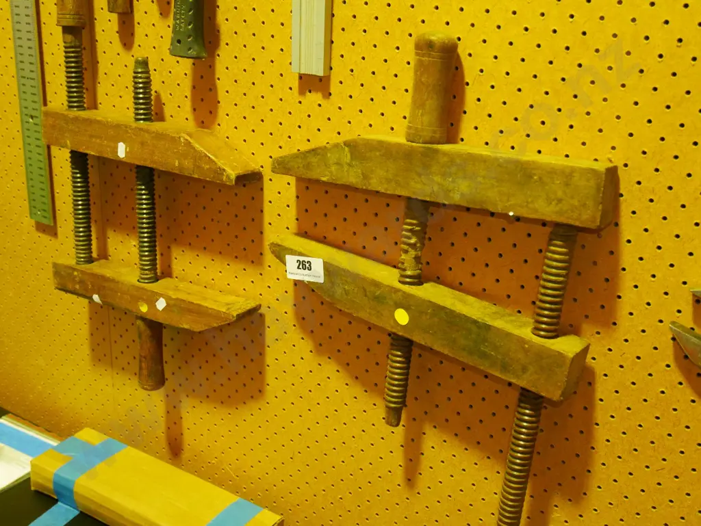 pair of wooden clamps Image 1++