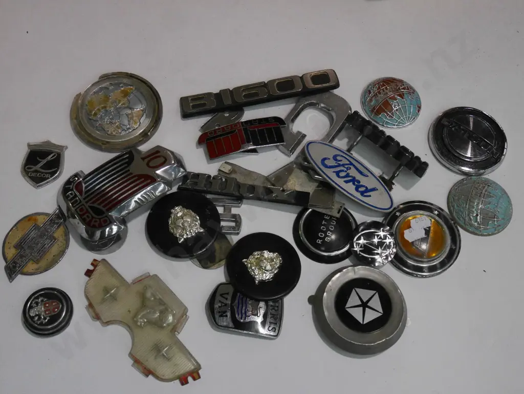 box of various car badges Image 1++