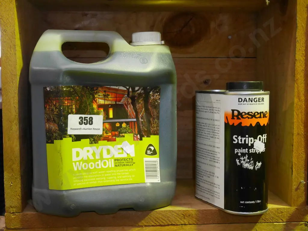 containers of wood oil and paint stripper Image 1++