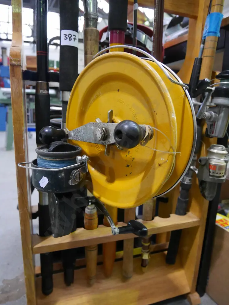 boat rod with large reel, rod & reel & one other rod (green dots) Image 1++