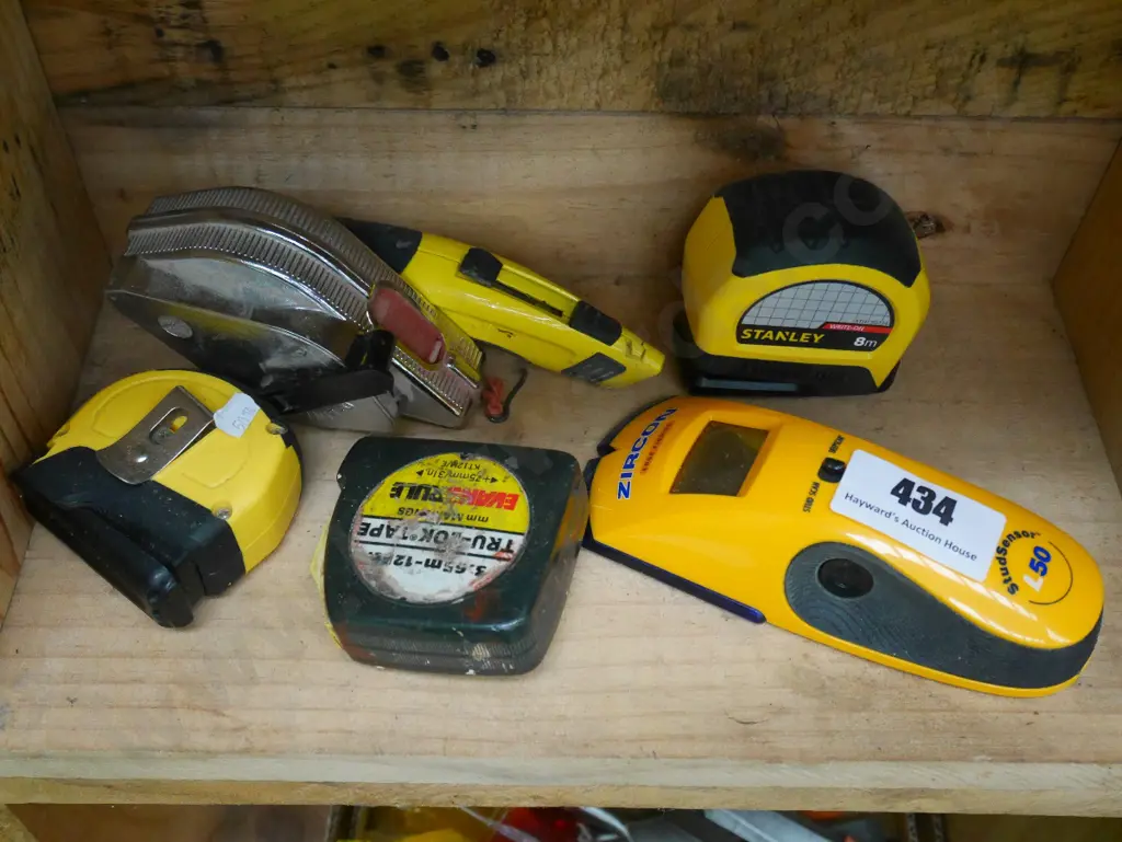 tape measures, string line, stud finder, craft knife Image 1++