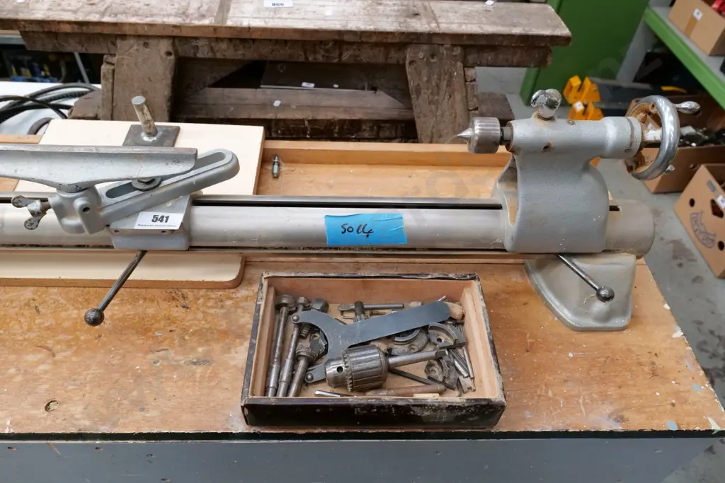 Myford woodworker's lathe on homemade cabinet with 1 box of various chucks and drill bits, box of sanding accessories Image 1++