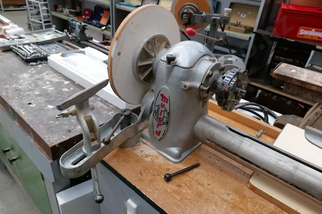 Myford woodworker's lathe on homemade cabinet with 1 box of various chucks and drill bits, box of sanding accessories Image 1++