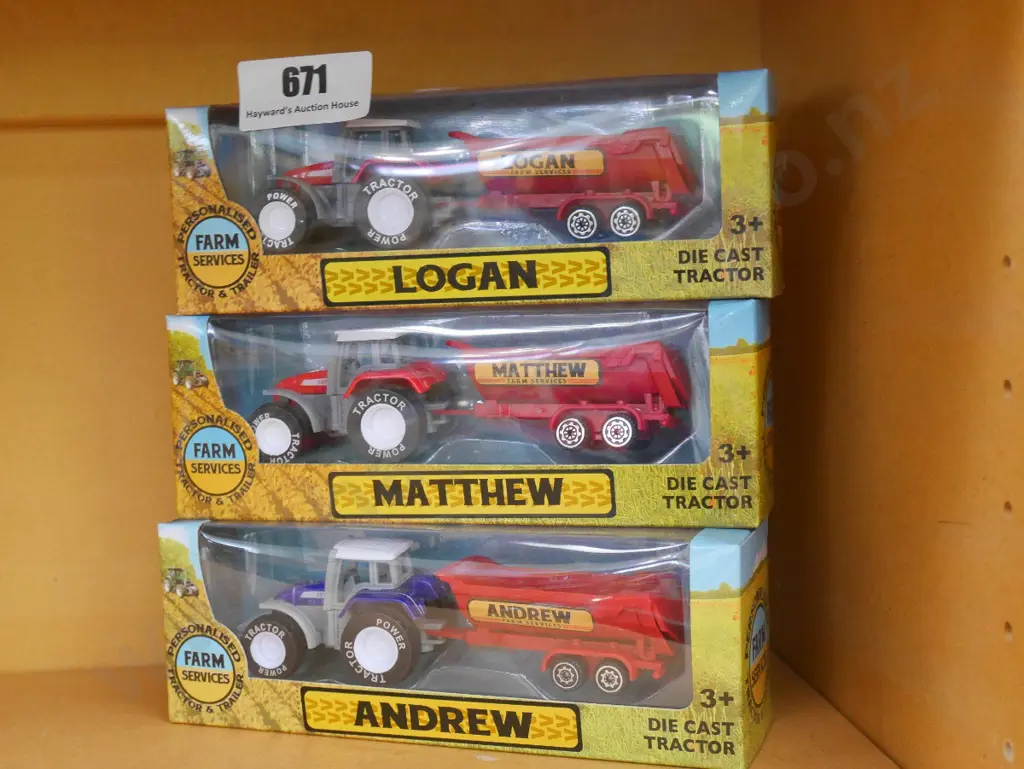 3 boxed tractor and trailer model vehicles Image 1++