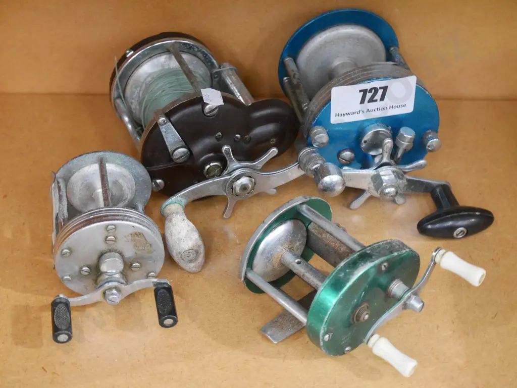 4 vintage fishing reels Image 1++