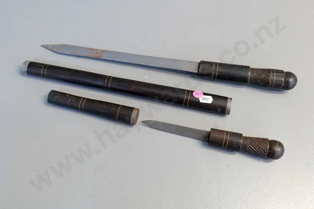 2 knives in wood and metal sheaths - larger one is L-430 closed Image 1++