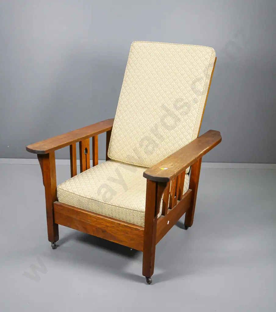 oak arts & crafts Morris chair with beige damask covered squabs, on casters H1030 W750 D900 Image 1++