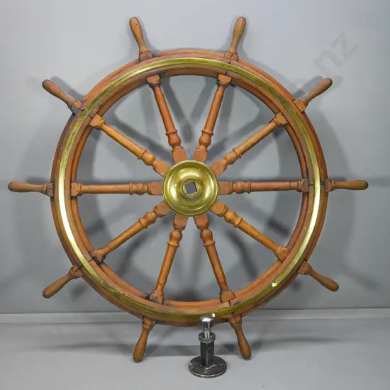 very large vintage ship's wheel with brass hub and band, modern wall mounting bracket - one 'handle' off D1760
