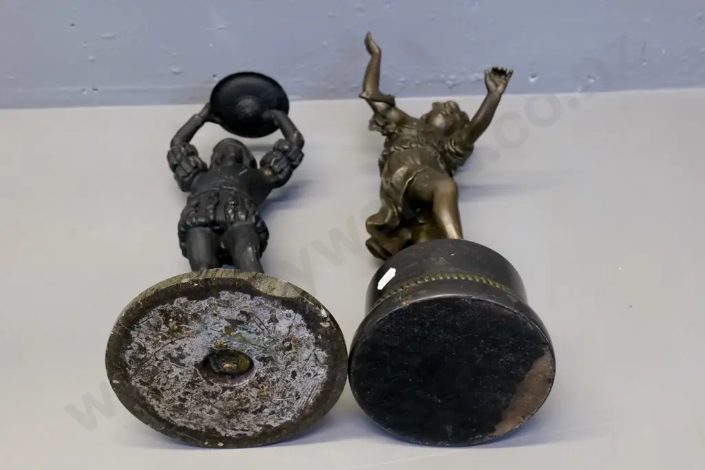 cast metal figural candle holder with chip to marble base and a figure of a child H-400, "E.Plat" stamped on base Image 1++