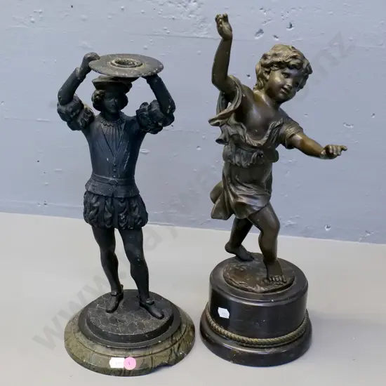 cast metal figural candle holder with chip to marble base and a figure of a child H-400, "E.Plat" stamped on base