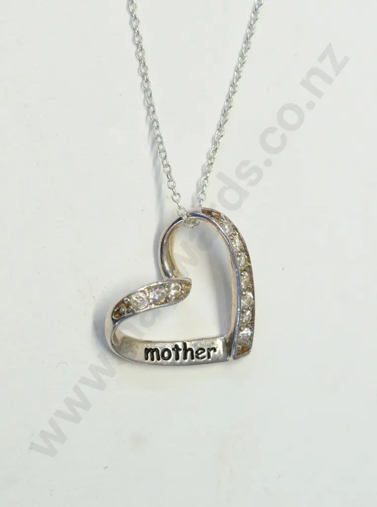 silver heart shaped necklace with czs & has mother engraved on it stamped 925 Image 1++