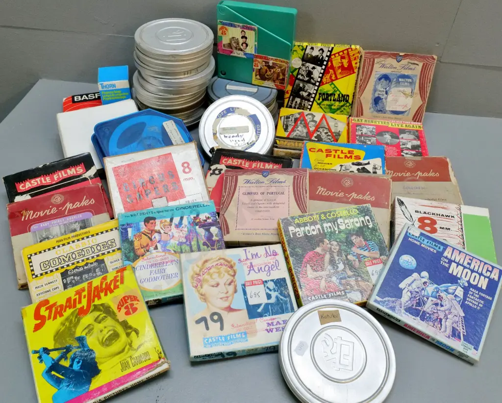 assorted 8mm films on 5" reels - some in unmarked tins: Mae West, Joan Crawford, Abbott & Costello, etc. Image 1++