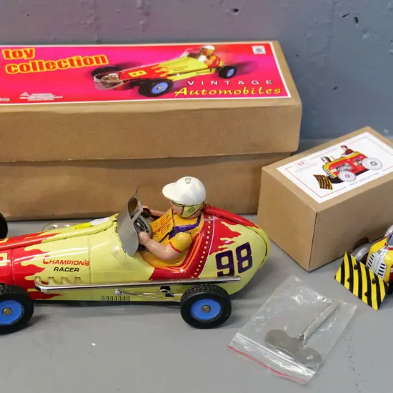 2 reproduction boxed tin toy vehicles, only one key - racing car is L-230