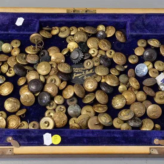 large assortment of brass & other military or uniform buttons - NZ, Australia, Canada etc on velvet lined wooden box lid