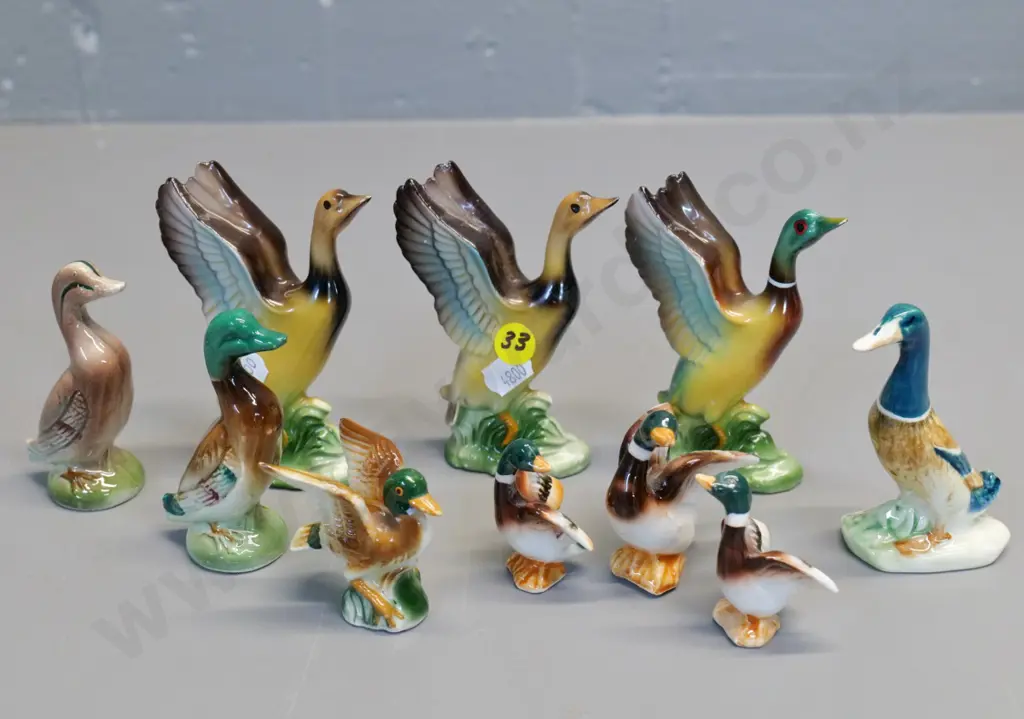 10 small ceramic duck ornaments - one marked England is Beswick, one marked Japan, others unmarked - tallest is H-110 Image 1++