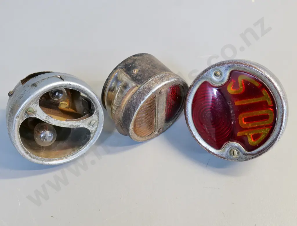 3 vintage automotive tail lights - Brown Bi-Lite with "Stop" lens, one missing lens - largest is Diameter 115 Image 1++
