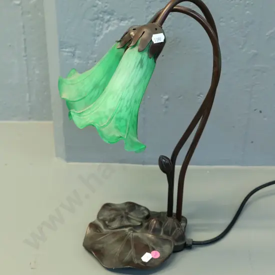 reproduction Tiffany style lamp with waterlily motif composite base, mottled green glass shades H420 W260