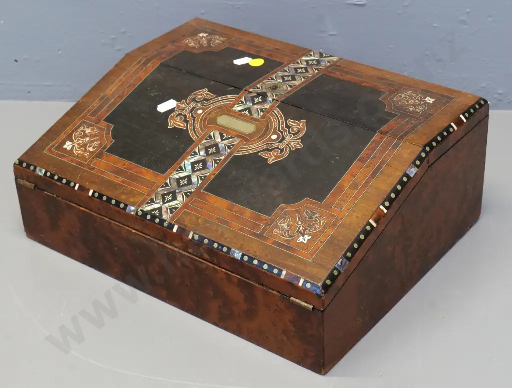 vintage writing slope w/burr veneer, mixed timber & paua inlay, 2 ink bottles, tin of nibs, some cracking to veneer Image 1++